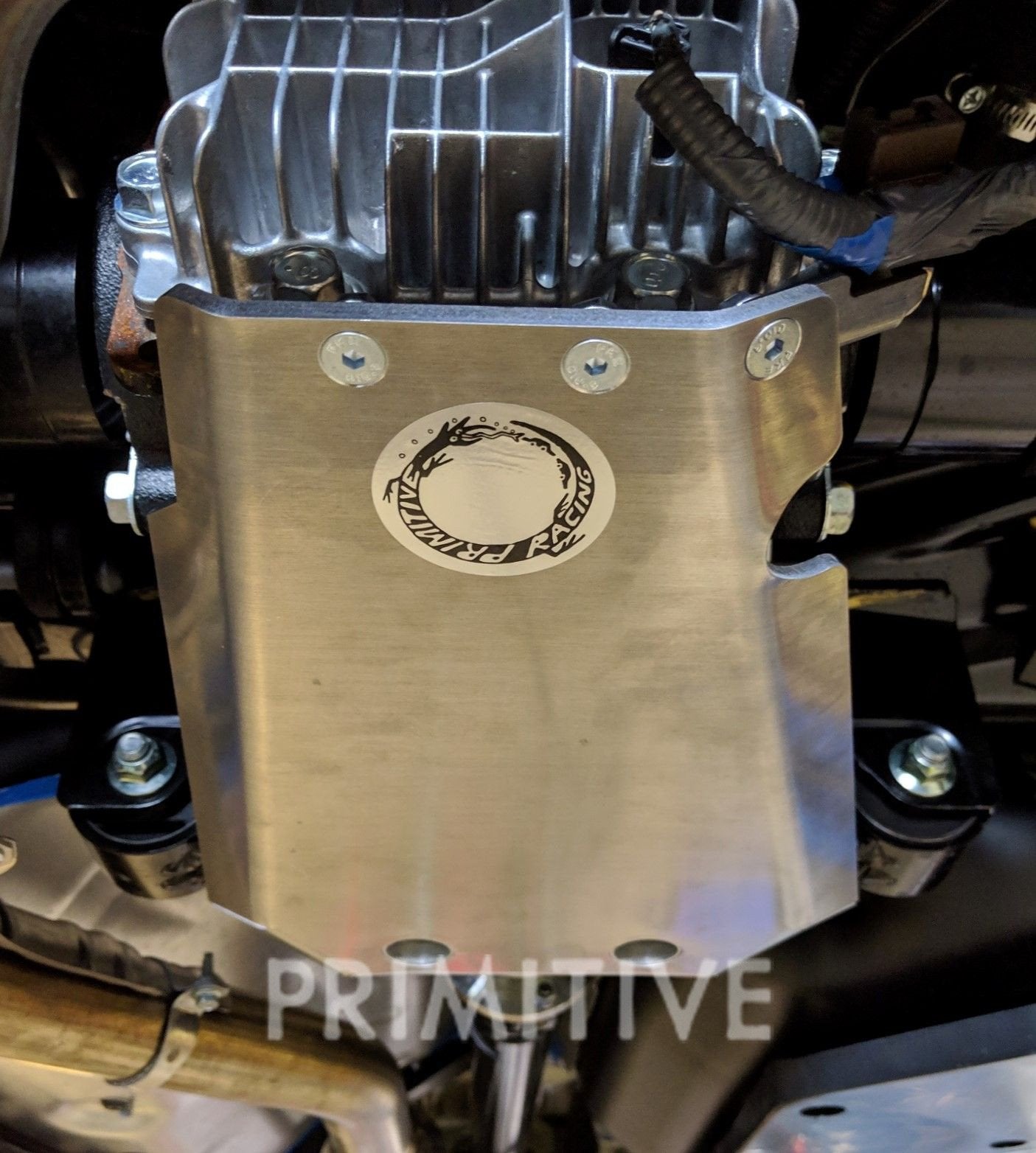 Uni+ Side Drain Rear Skidplate